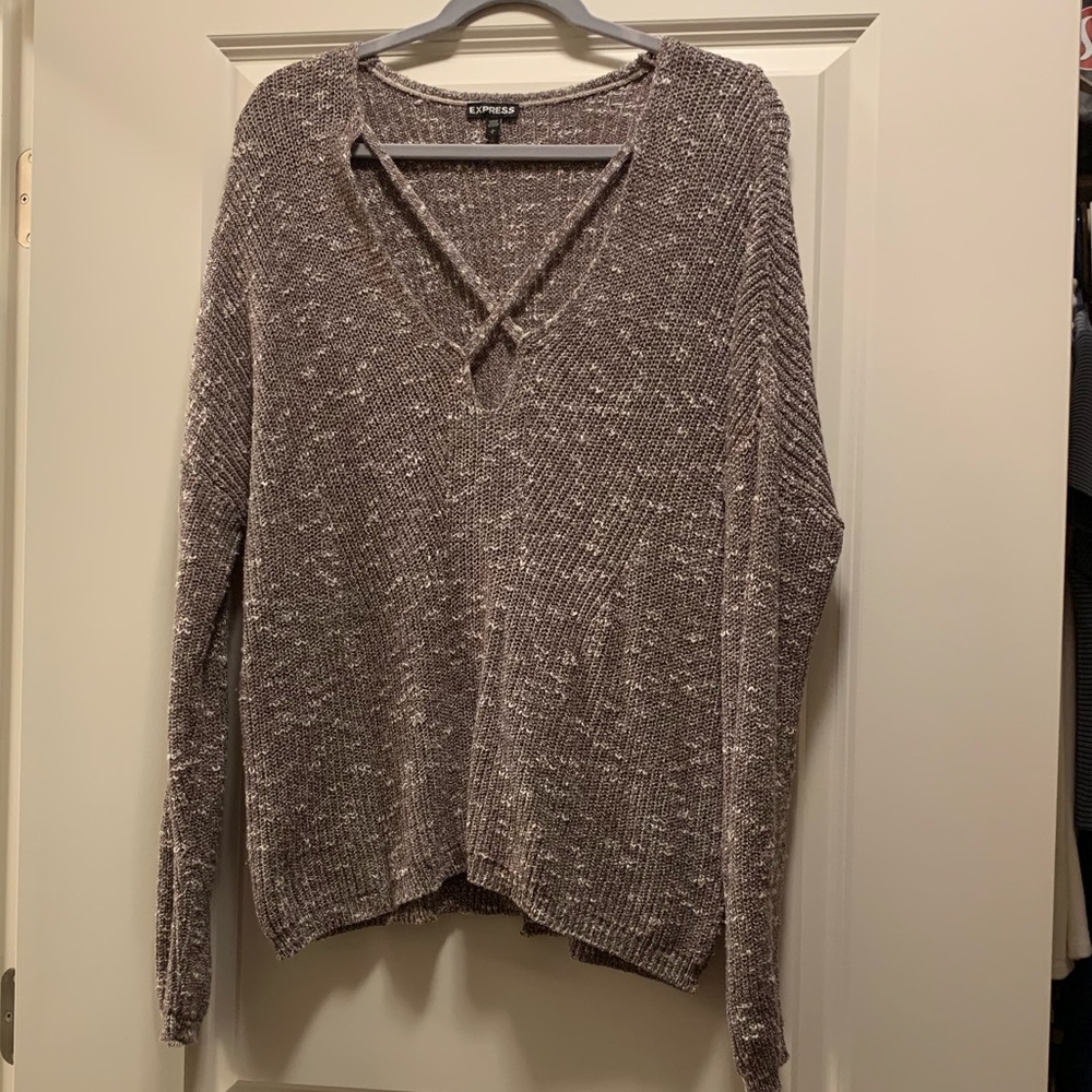 Cozy sweater with crisscross neck detail
